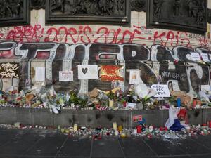 A memorial in Paris commemorates the 132 people who lost their lives in the Friday terrorist attacks on the city.