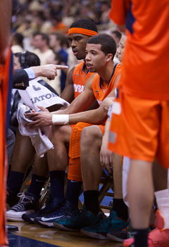 Syracuse coach Jim Boeheim points and gives direction to guard Michael Carter-Williams. Carter-Williams finished the game with 13 points and only two assists on 3-12 shoooting. 