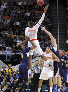 James Southerland leaps up for a pass in the first half of Syracuse's win over Cal.