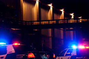 Police cars are parked outside the Carrier Dome on Friday night after a man was stabbed inside the venue during Orange Madness. The victim, a 25-year-old male, is in serious but stable condition.