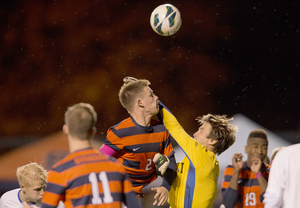 Jordan Vale heads a ball during Syracuse's 2-0 victory over DePaul Saturday. Vale scored the team's second goal, helping SU clinch a berth in the Big East tournament.