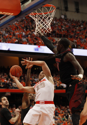 Brandon Triche forced shots and committed seven turnovers in the Orange's loss to Louisville Saturday.