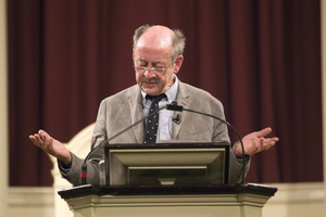 Billy Collins recites one of his many poems in Hendricks Chapel on Wednesday night. Known for his humor, Collins read poems including “Cheerios,” “After the Funeral,” “Oh, My God!” and “Divorce,” which is one of the more serious poems in the collection. 