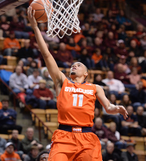 Tyler Ennis elevates for a layup in Syracuse's 72-52 win against Virginia Tech. Ennis finished with 13 points and seven assists, keying the Orange's 16-0 second-half run.