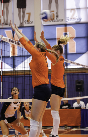 Graduate student Stacey Smith (1) has struggled with her footwork and communication skills in her transition to outside hitter, a position she'd never played before transferring to Syracuse for this season.