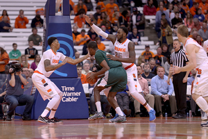 Chris McCullough (left) and Rakeem Christmas will likely hear their names called between the late first and early second rounds during Thursday's NBA Draft.