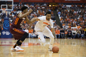 Fifth-year senior Michael Gbinije will likely be Syracuse's primary ball-handler this season. Orange head coach Jim Boeheim expects him to be among the Atlantic Coast Conference's top players this season.  