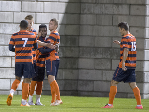 Julian Buescher (Second from right) extended his point streak to nine games with the game-winning assist late in the second half.