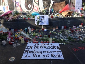 A memorial in Paris commemorates the 132 people who lost their lives in the Friday terrorist attacks on the city.