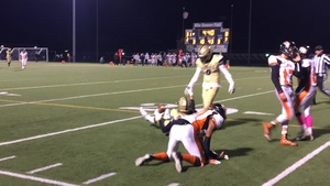 John Benson gets helped up after reeling in a 38-yard catch down the sideline for West Genesee. It was one of two catches over 30 yards for the 6-foot-6 Benson.