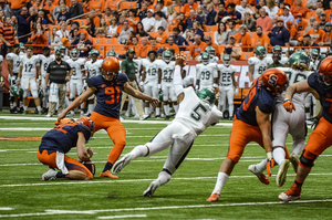 Andre Szmyt attempts a field goal against Wagner.