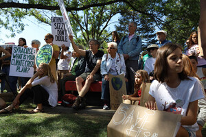 Members of Sunrise CNY led chants including “climate change is not a lie, do not let our planet die.”