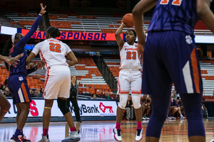 Kiara Lewis scored 11 points for Syracuse, but it was Amaya Finklea-Guity's (left) 15 that led the way for SU against Virginia.