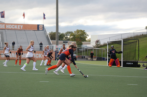 SJ Quigley goes for a shot against the Virginia defense.