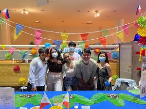 The Filipino Student Association presented a fiesta-themed table at the International Festival, featuring pancit bihon and pastillas