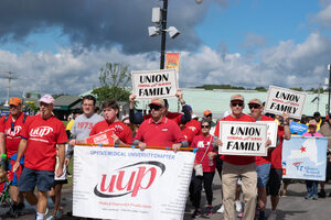 Members of the Upstate Medical University chapter of United University Professions parade around with signs reading, “Union Family, Strong Always.” Hundreds of attendees of the rally represented their respective unions with colorful t-shirts and banners.