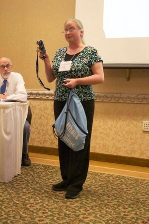 Pamela Ameigh, a resident of Ithaca, discusses sustainable transit at the conference held Monday afternoon.