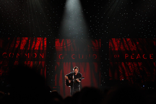 Dave Matthews performs on stage.