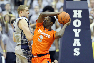 Jerami Grant attempts to create space against Nate Lubick.