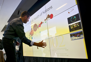 Ken Harper, associate professor in multimedia, photography and design, uses a screen that's been added as part of the studio renovations in Newhouse II.