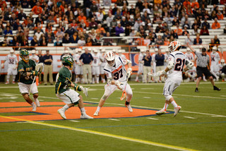 Williams cradles the ball in his stick after winning a faceoff. He went 17-for-20 at the faceoff X and looks to be the Orange's solution at that spot.