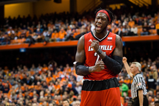 Harrell flexes his muscles in reaction to a play. He had 12 points on 5-of-6 shooting in the opening frame.