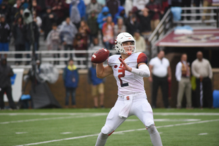 Dungey cocks his arm back to throw. He went 32-of-38 passing against the Eagles.