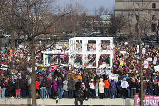 Organizers estimate that about 2,000 people were in downtown Syracuse for the protest. They were packed onto the lawn of the James M. Hanley Federal Building.