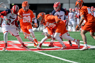 SU faceoff specialist Ben Williams gets ready to chase down a ball to start play. 