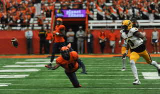 Steve Ishmael seemed to break away for a touchdown before a CMU defender burst onto the scene to punch the ball away from him. 