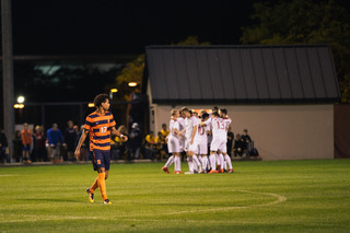 After a NC State goal, Buchanan walks off in the distance.