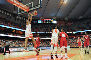 Syracuse forward Matt Moyer dunks the ball.