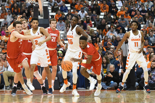 Cornell guard Matt Morgan scrambles for a loose ball.