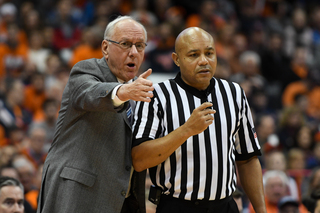 Jim Boeheim argues with a referee. 