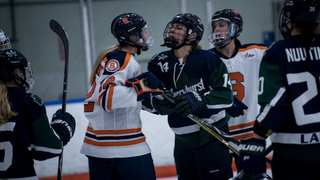 Syracuse and Mercyhurst players exchange words after the whistle. The two teams play twice each year. 