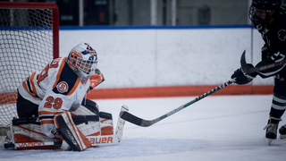 Abbey Miller makes on of her 26 saves on Friday night. 