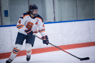 Lindsay Eastwood handles the puck in her own zone. 