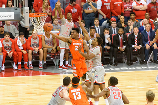 Battle takes layup through traffic.