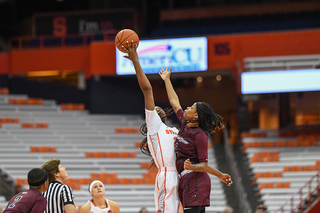 Finklea-Guity reaches up for a ball.