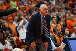 Jim Boeheim rose from the SU bench.