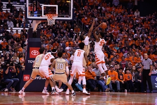 Elijah Hughes attacks the rim. He had 12 points.