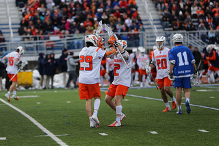 Rehfuss and Jamie Trimboli (right) celebrates. 