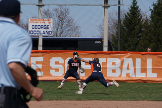 Hansen lunges for a ball in left field. 