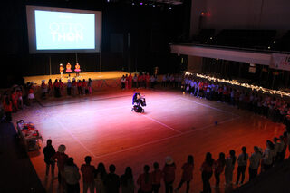 Dancers form a reflection circle around one of the Miracle Children to end the night. This was a way for participants to think about the impact all of their efforts have on Upstate Golisano Children’s Hospital.